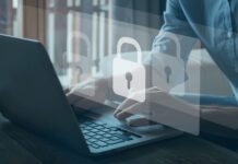 Immagine presa da Canva che raffigura un computer portatile e il simbolo del lucchetto. Utilizzata per l'articolo di giornale che tratta l'argomento della sicurezza informatica